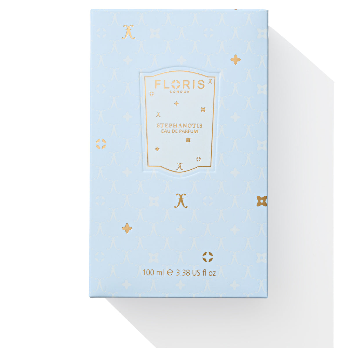 A sophisticated light blue perfume box with gold accents showcases the label "Floris London UK Stephanotis - Eau de Parfum | Limited Edition," exuding notes of jasmine and stephanotis.