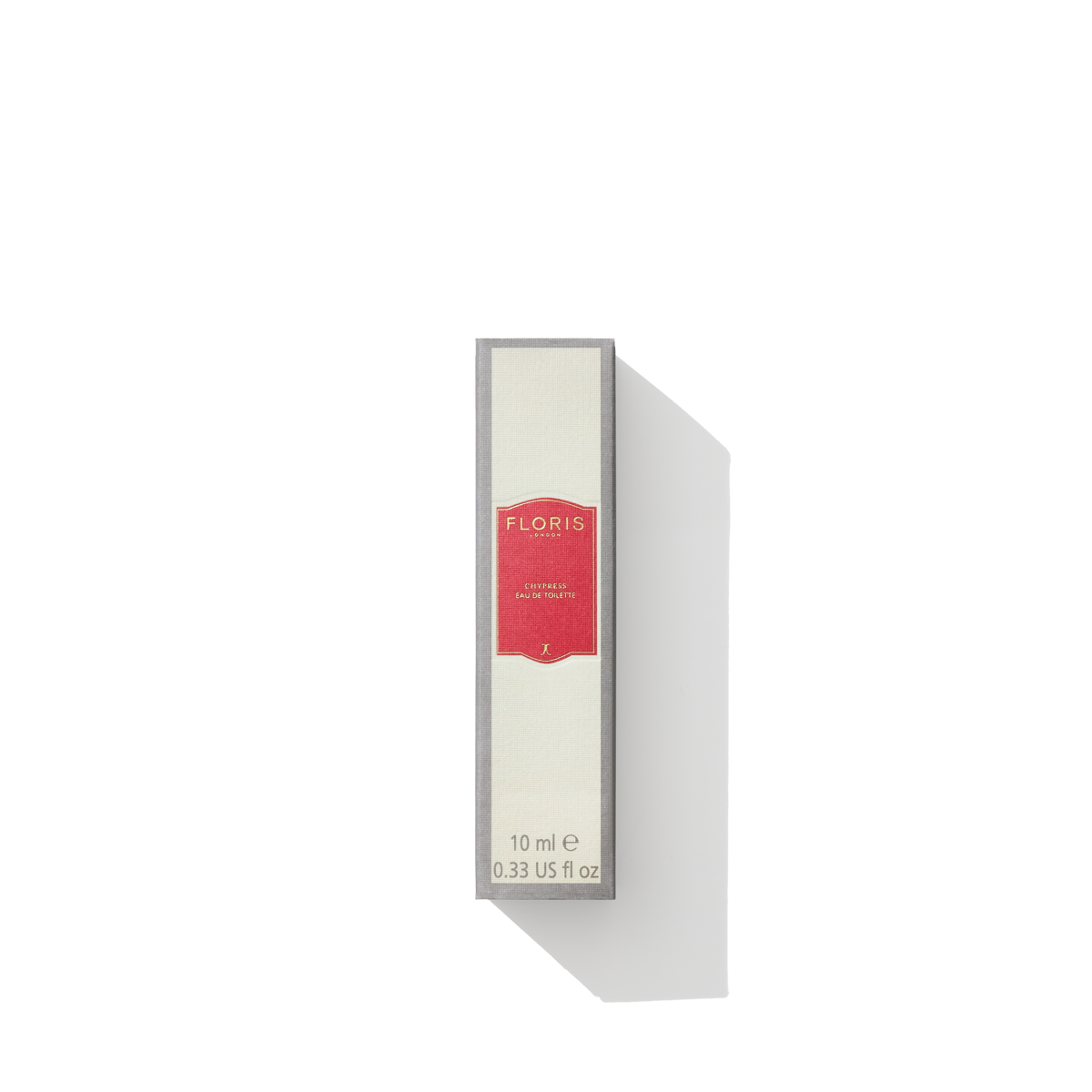 A white box with a red label reading "FLORIS London Chypress Eau de Toilette" contains a mix of enveloping musk and bergamot zest. Text below reads "10 ml 0.33 US fl oz.