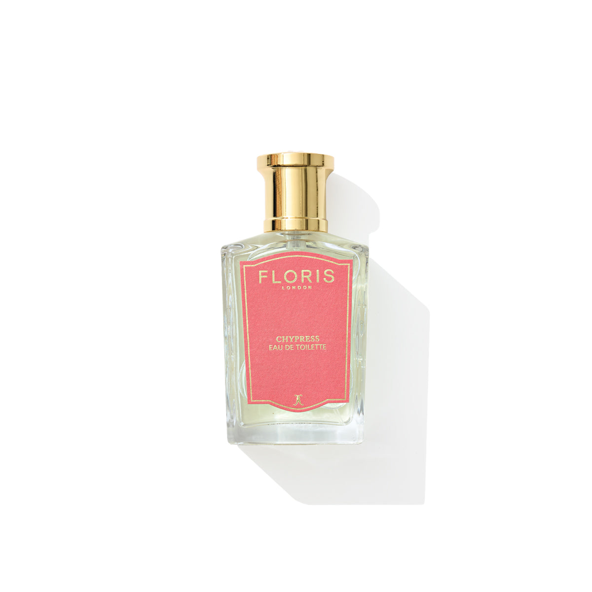 A glass perfume bottle with a gold cap, labeled "Chypress - Eau de Toilette" by Floris London on a pink label, exudes hints of orange flowers.