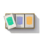 A luxurious set of three exquisitely crafted soaps from Floris London, beautifully packaged in vibrant green, purple, and orange against a pristine white background. This elegant Soap Collection | Pick Your Own makes for a timeless personalized gift set.