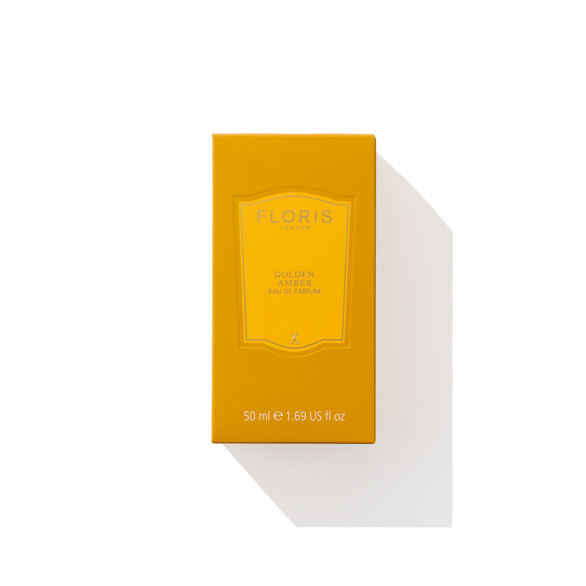 A box of Floris London Golden Amber - Eau de Parfum in yellow, beautifully displayed on a white background, highlighting its luxurious and vegan-friendly fragrance.