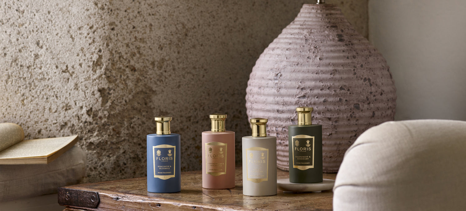 Floris London Room Fragrances, placed upon a wooden chest in a sea side cottage. 