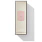 a large white box with pink label