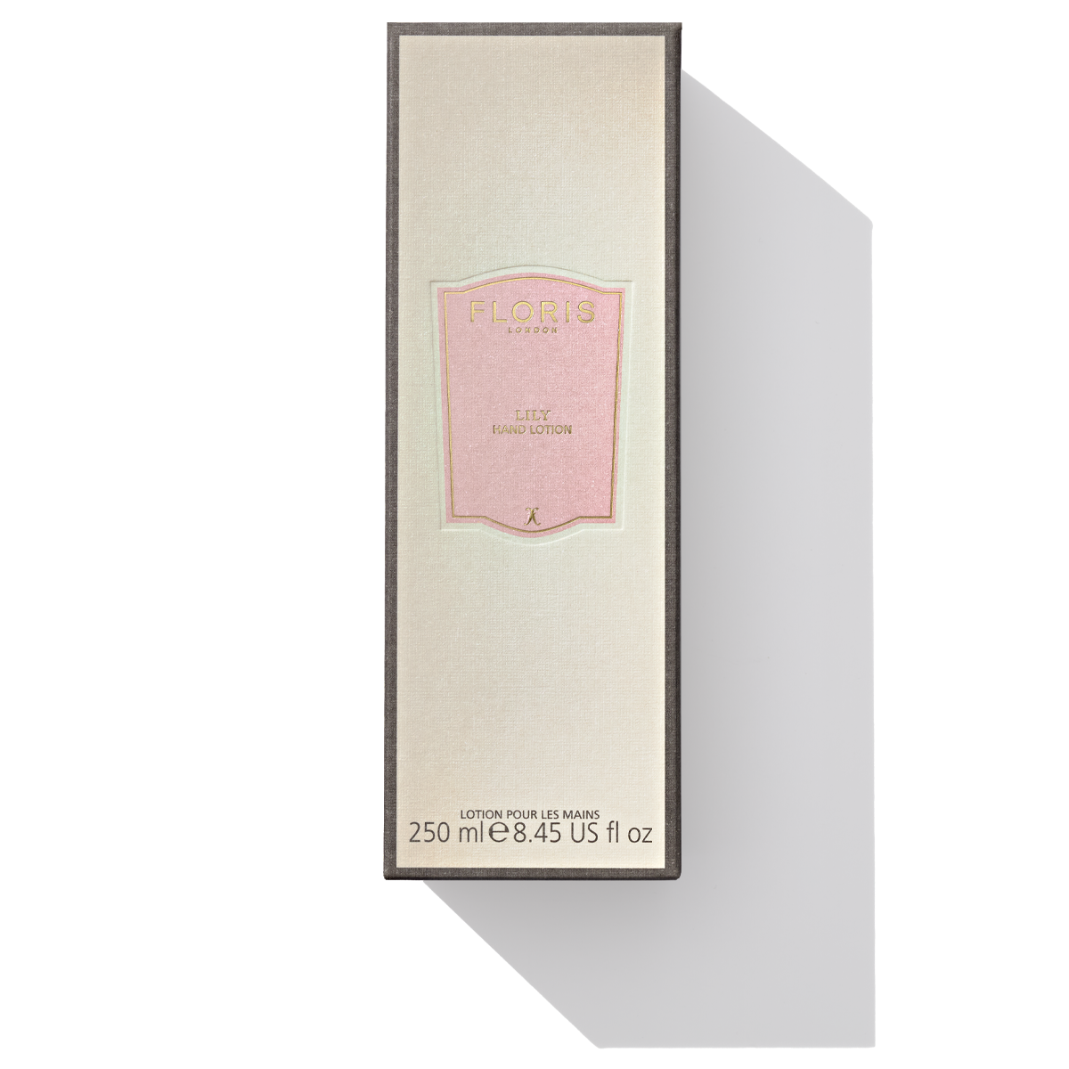 a large white box with pink label