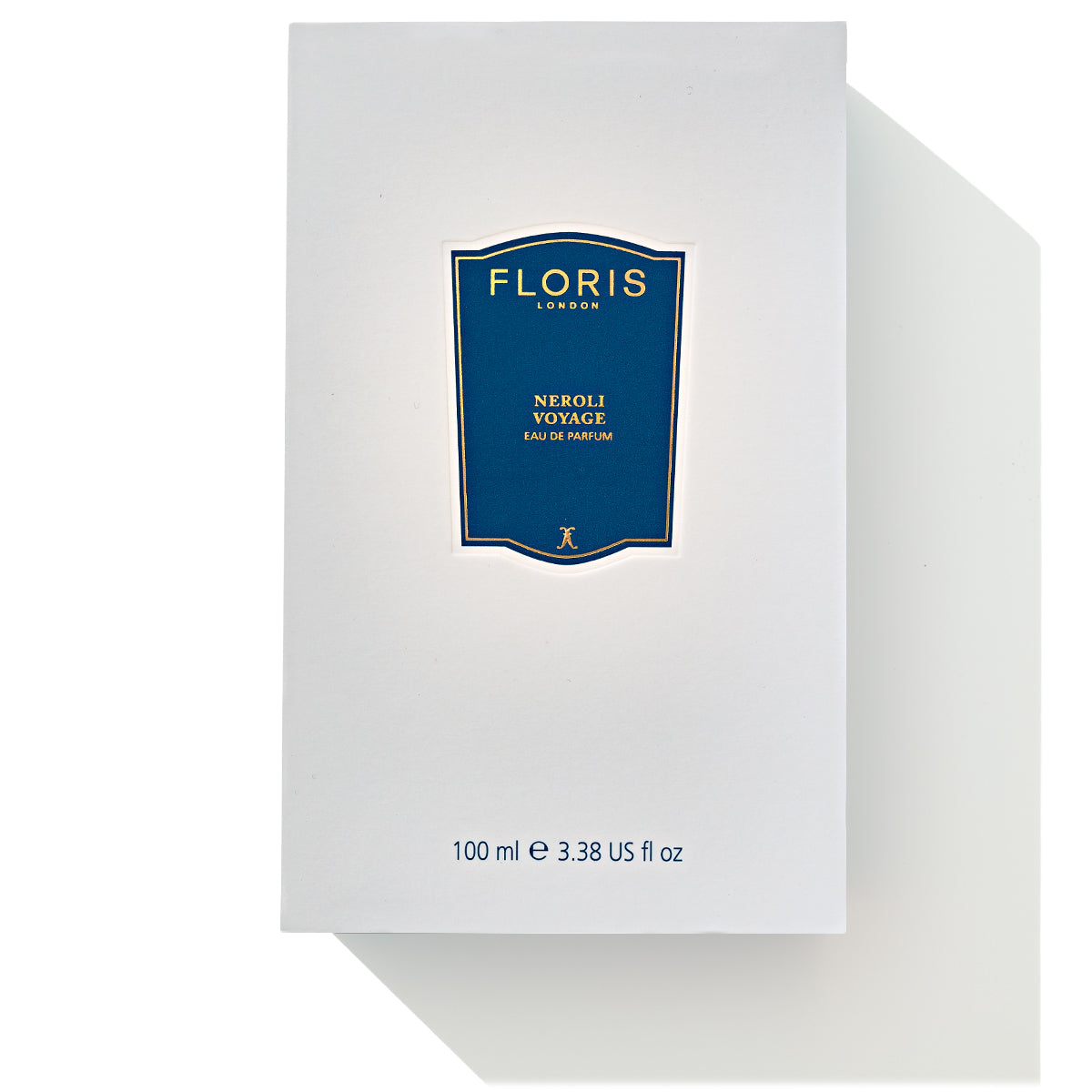 A white box with a dark blue label for Floris London's Neroli Voyage - Eau de Parfum, 100 ml (3.38 fl oz), promising a citrus burst of refreshing fragrance.