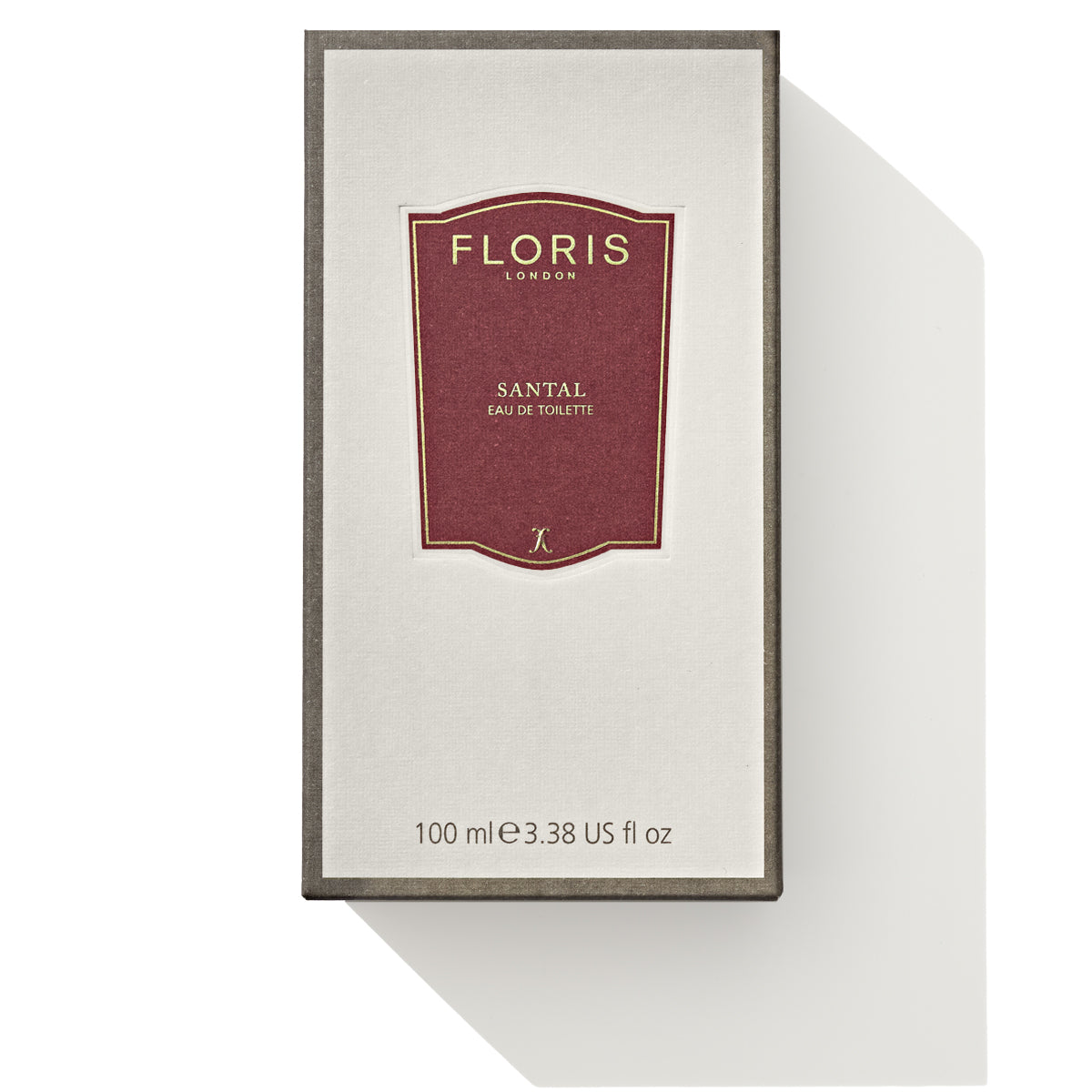 A rectangular box labeled "Santal - Eau de Toilette" by Floris London, part of the men's signature collection, exudes a refined woody fougère scent and contains 100 ml (3.38 US fl oz) of perfume.