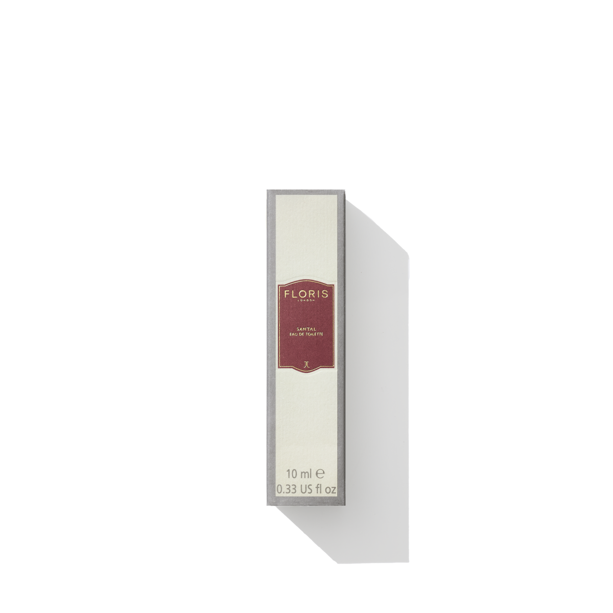 A 10 ml boxed bottle of Floris London Santal Eau de Toilette from the men's signature collection, featuring a red and cream label that casts a shadow on a white background. The santal fragrance imparts an elegant woody fougère allure.