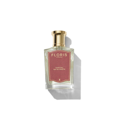 Bottle of Floris London Santal Eau de Toilette, a sandalwood fragrance with a red label and gold cap on white; ideal as a men's signature scent.